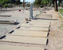 There is a memorial in the cemetery dedicated to 16 burials of immigrant farmers who died in 1959 in a bus accident in the city.